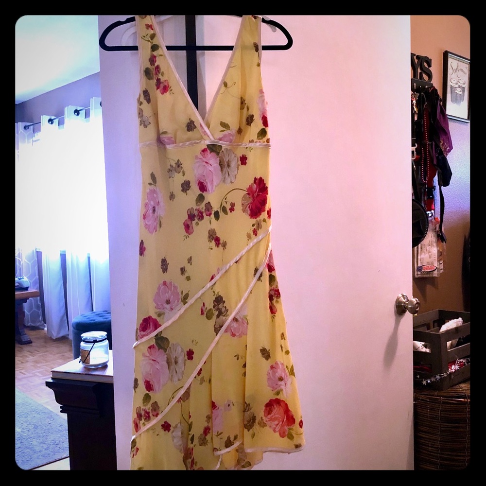 Beautiful, asymmetrical yellow dress.